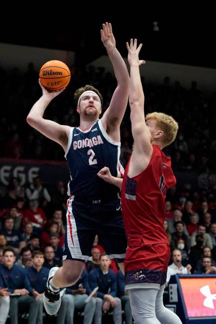 Gonzaga forward Drew Timme (2) shoots against Saint Mary's forward Matthias Tass during an NCAA ...