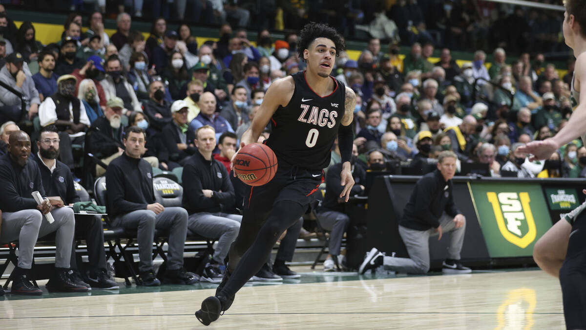 Gonzaga guard Julian Strawther (0) drives to the basket against San Francisco during the second ...