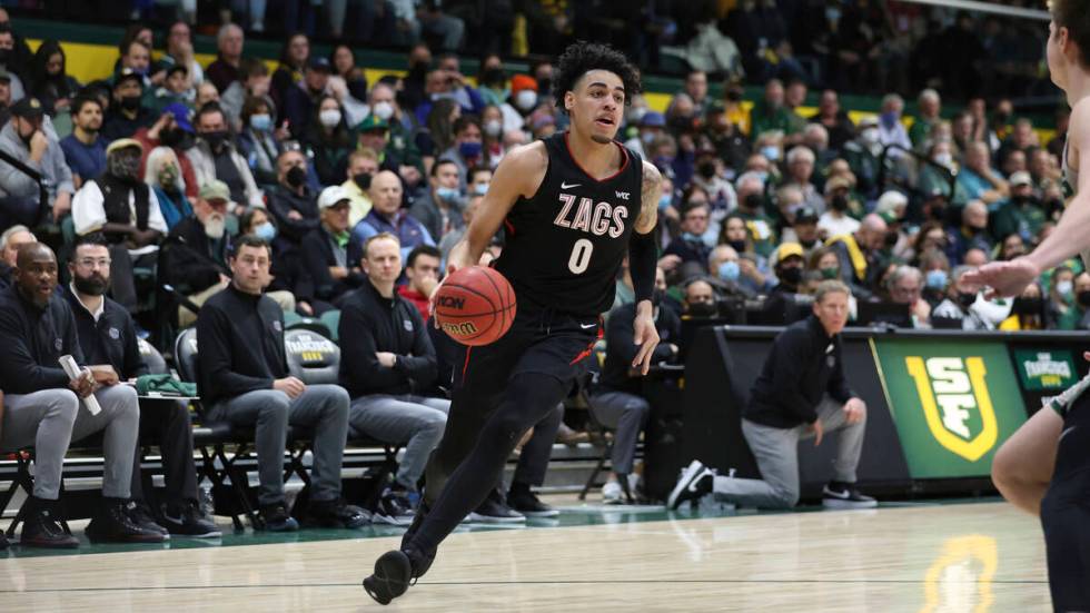 Gonzaga guard Julian Strawther (0) drives to the basket against San Francisco during the second ...