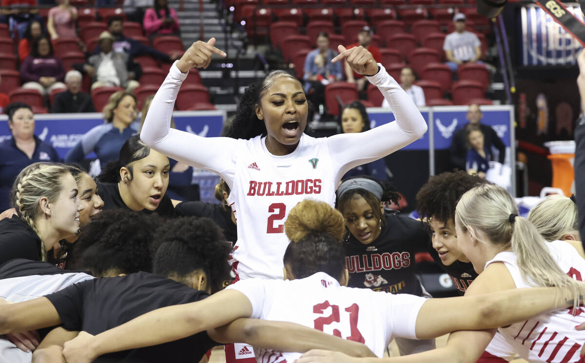 Fresno State Bulldogs forward Wytalla Motta (24) rallies the team before the start of a Mountai ...