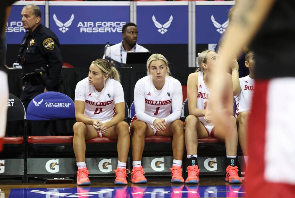 Fresno State Bulldogs guards Hanna Cavinder (0) and Haley Cavinder (1) wait to be introduced be ...