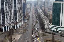 Traffic jams are seen as people leave the city of Kyiv, Ukraine, Thursday, Feb. 24, 2022. Russi ...