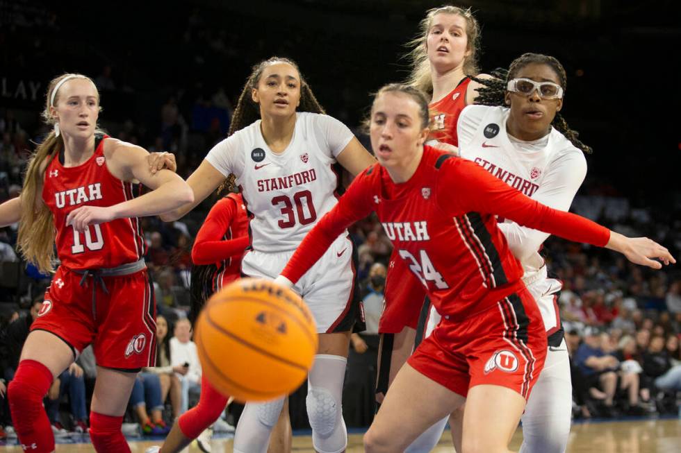 From left, Utah guard Dru Gylten, Stanford guard Haley Jones, Utah guard Kennady McQueen, Utah ...