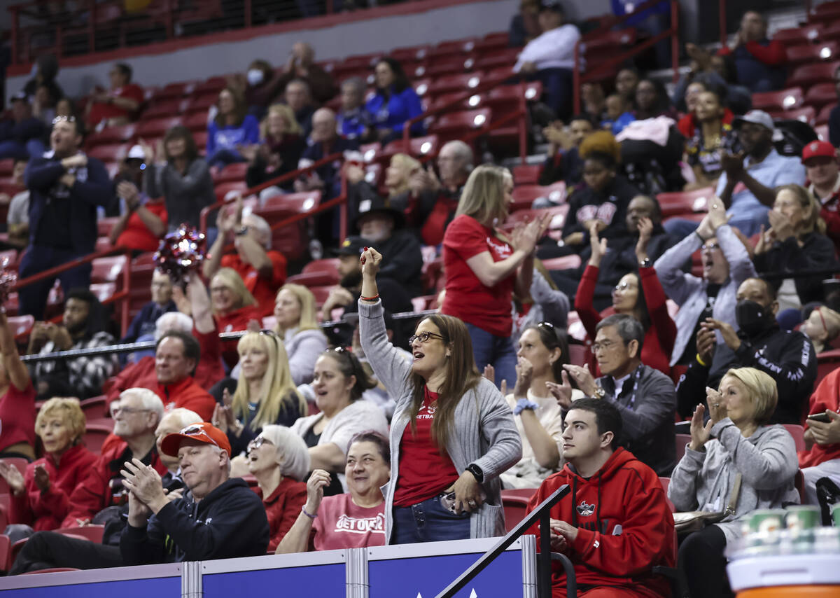 UNLV Lady Rebels fans cheer during the second half of quarterfinal Mountain West tournament bas ...