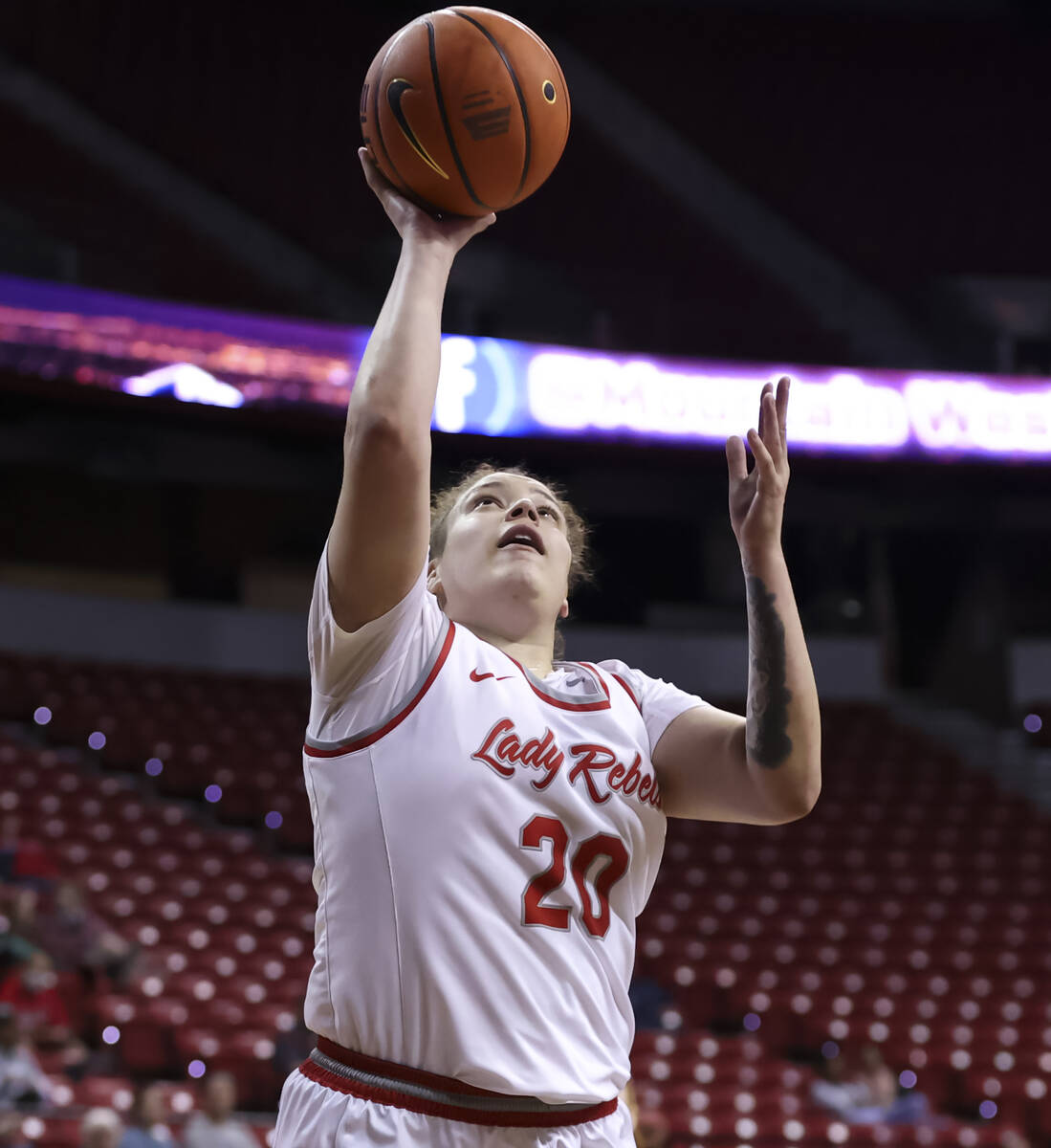 UNLV Lady Rebels forward Khayla Rooks (20) lays up the ball against the Utah State Aggies durin ...