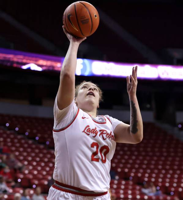 UNLV Lady Rebels forward Khayla Rooks (20) lays up the ball against the Utah State Aggies durin ...