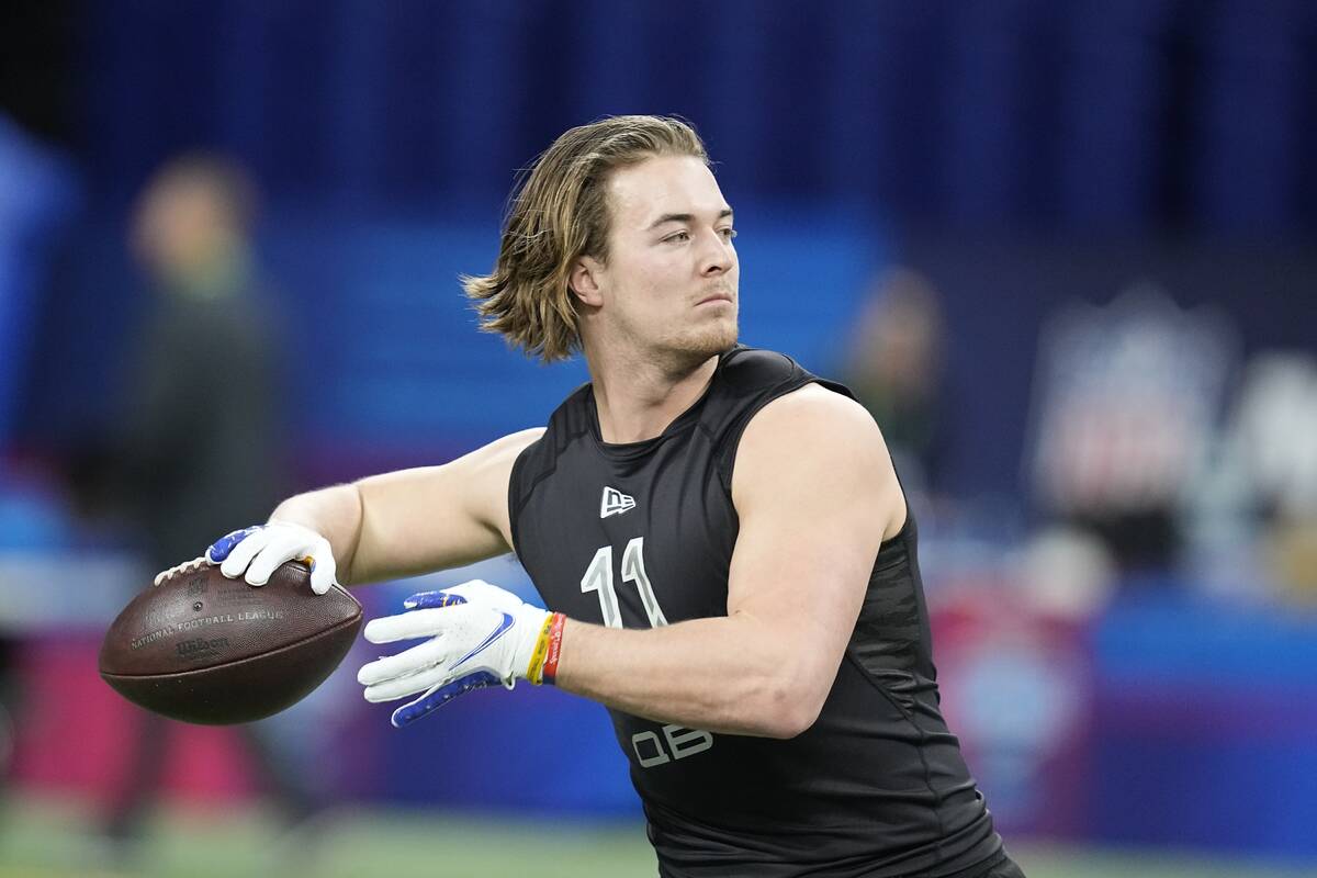 Pittsburgh quarterback Kenny Pickett runs a drill during the NFL football scouting combine, Thu ...