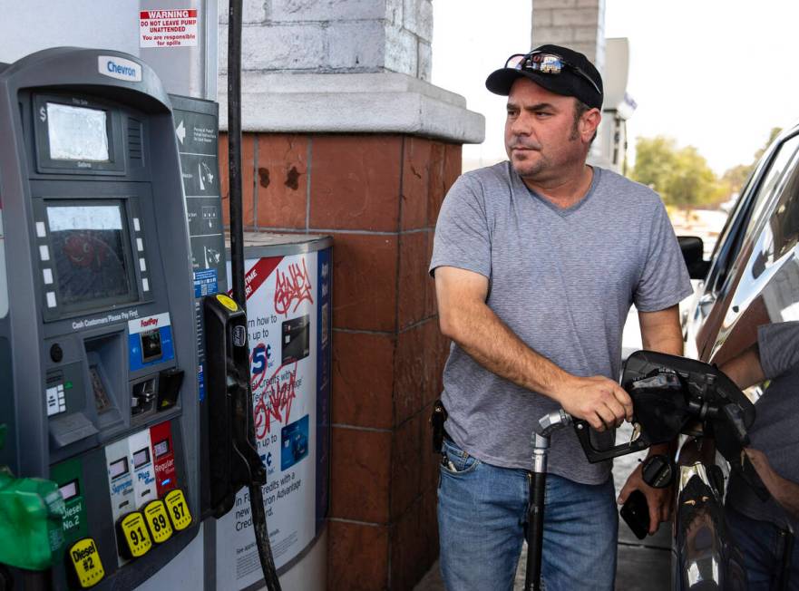 David Newman of Las Vegas pumps gas at Terrible’s on Torrey Pines Drive on Monday, March ...