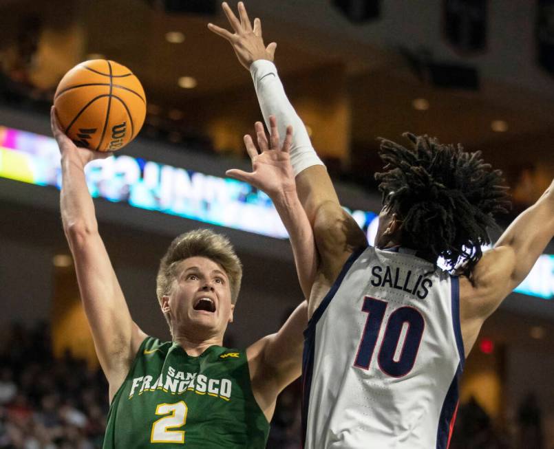 San Francisco Dons guard Julian Rishwain (2) shoots over Gonzaga Bulldogs guard Hunter Sallis ( ...