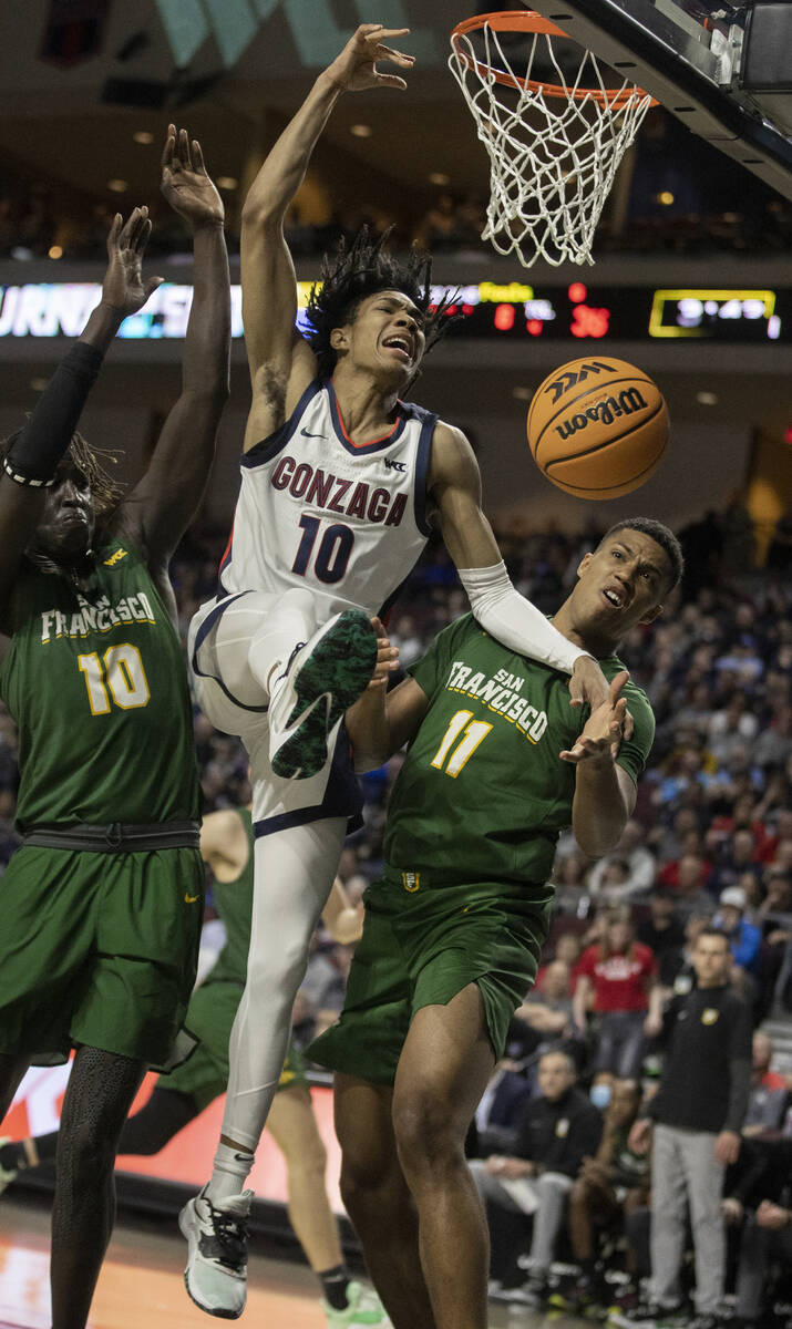 Gonzaga Bulldogs guard Hunter Sallis (10) fights for a loose ball with San Francisco Dons forwa ...