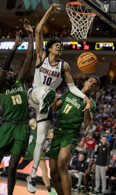 Gonzaga Bulldogs guard Hunter Sallis (10) fights for a loose ball with San Francisco Dons forwa ...