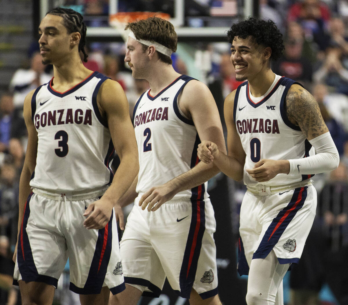 Las Vegas native and Gonzaga Bulldogs guard Julian Strawther (0) shares a laugh with teammates ...