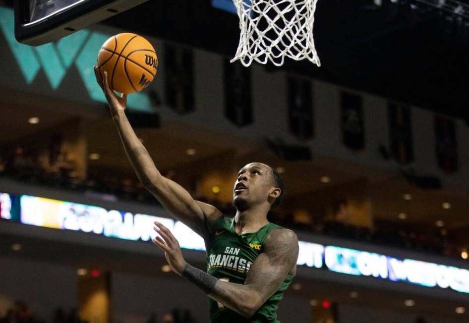 San Francisco Dons guard Jamaree Bouyea (1) converts a fast break layup in the first half of th ...