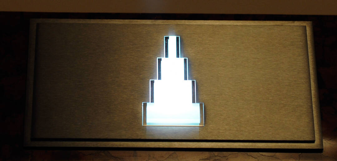 The up arrow for an elevator continues the art deco motif inside Reynolds Hall at The Smith Cen ...