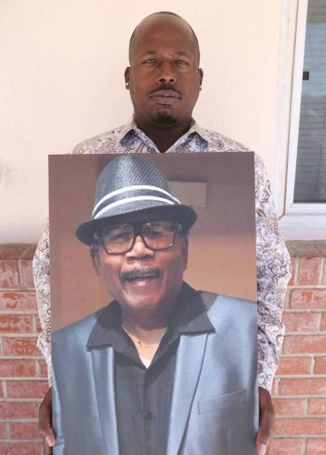 Leroy Brice, nephew of David Biddle Jr., hold a photo of his uncle Tuesday, March 8, 2022, in L ...