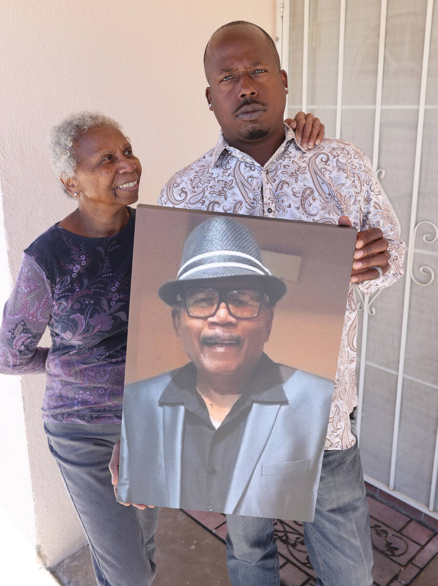 David Biddle Jr.’s sister Aletha Halcomb and nephew Leroy Brice hold his photo Tuesday, March ...