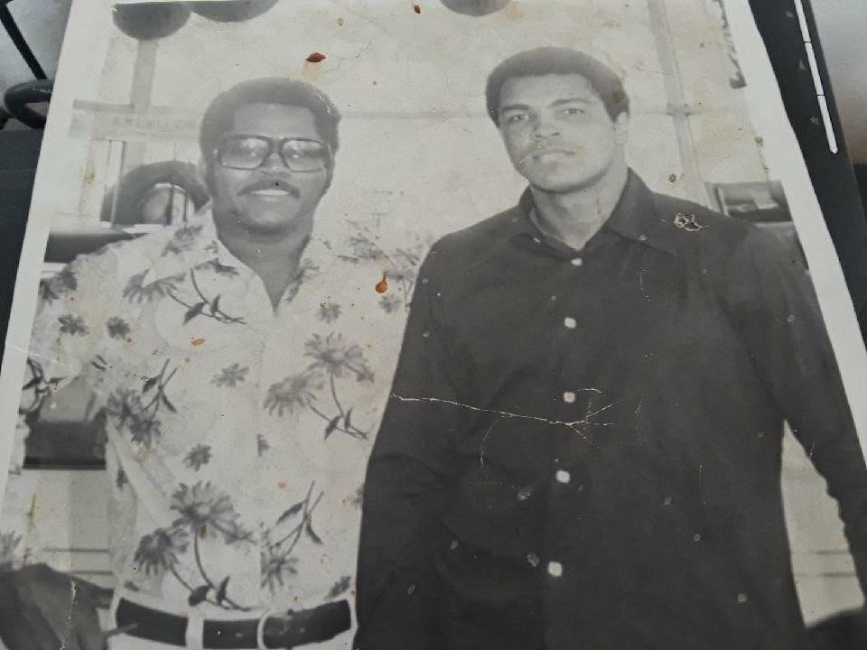 David Biddle Jr., left, with Muhammad Ali. (Photo provided by the Biddle family)