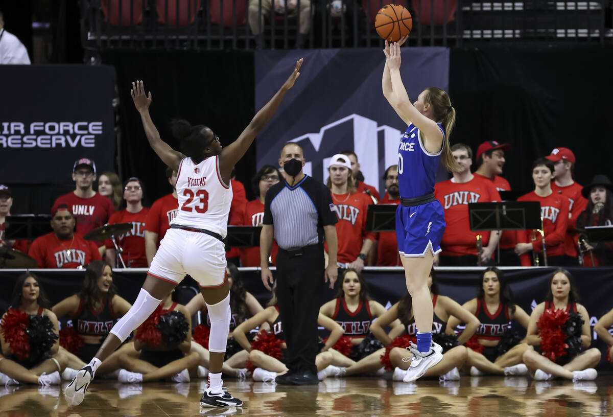 Air Force Falcons guard Kamri Heath (10) shoots over UNLV Lady Rebels center Desi-Rae Young (23 ...