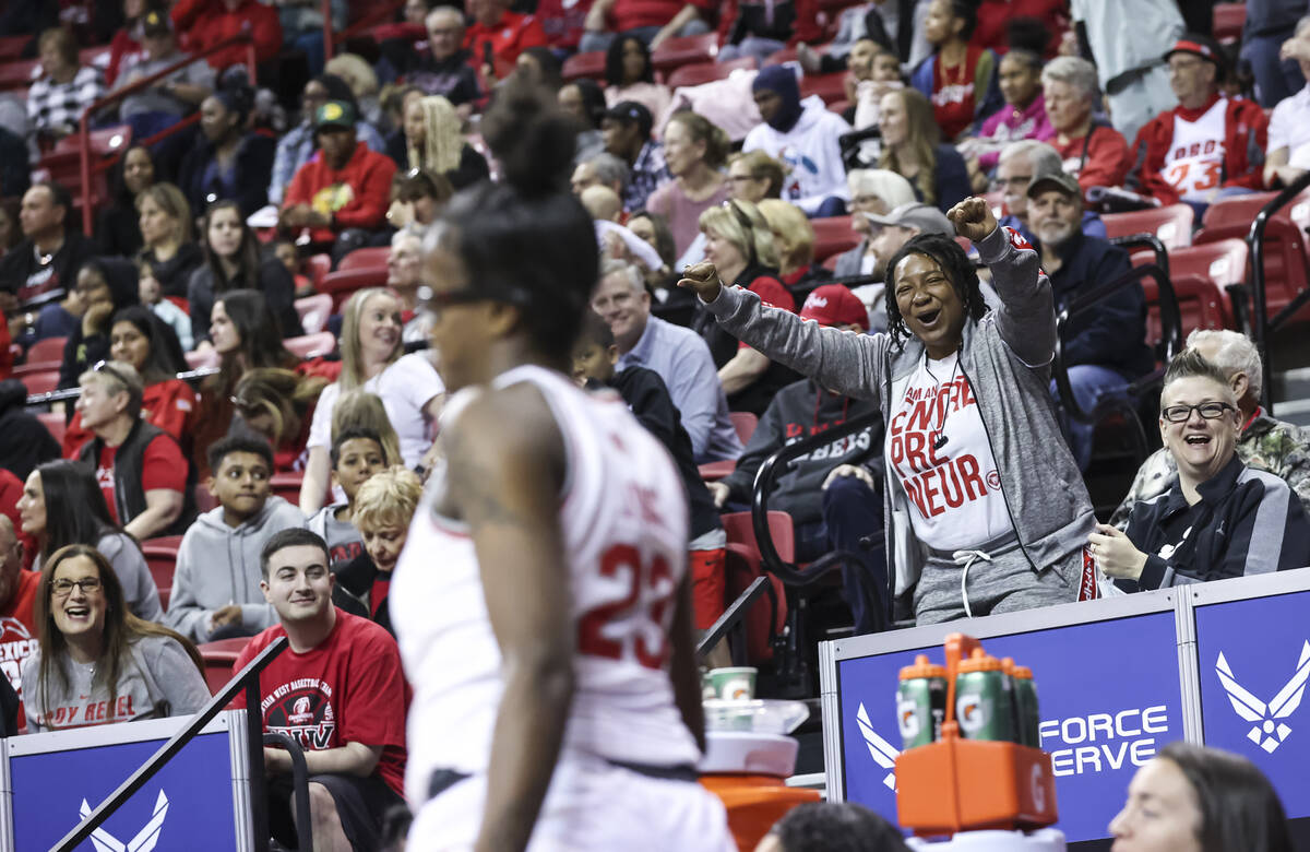 UNLV Lady Rebels fans cheer during the second half of a semifinal Mountain West tournament bask ...
