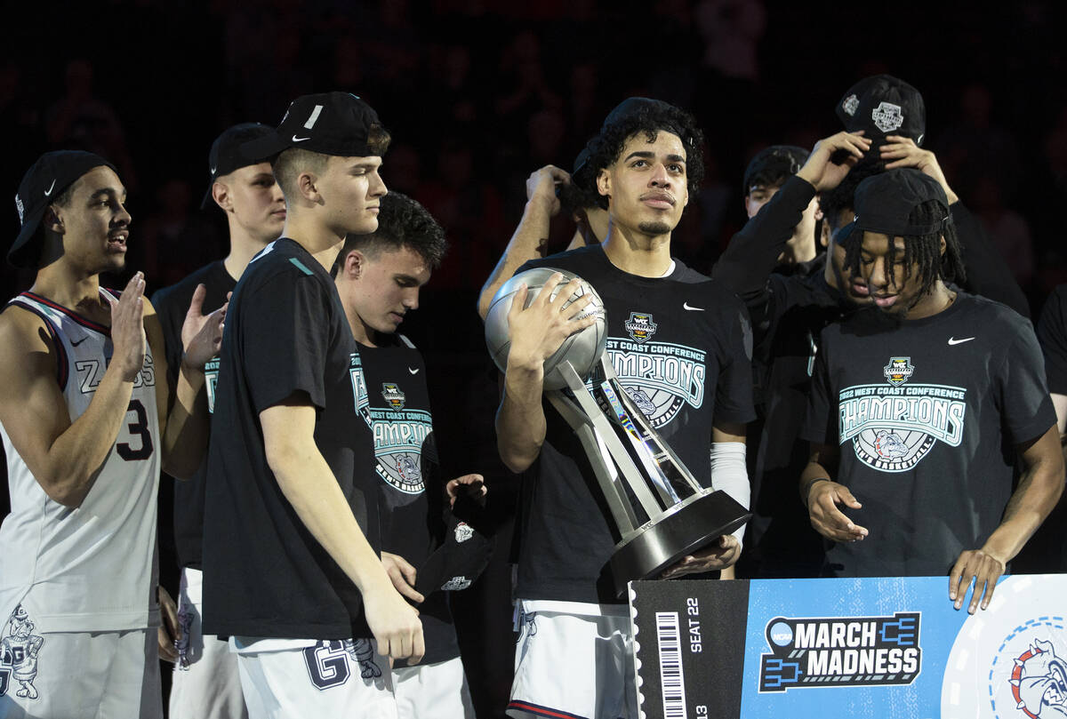 Las Vegas native and Gonzaga Bulldogs guard Julian Strawther, second from right, celebrates wit ...