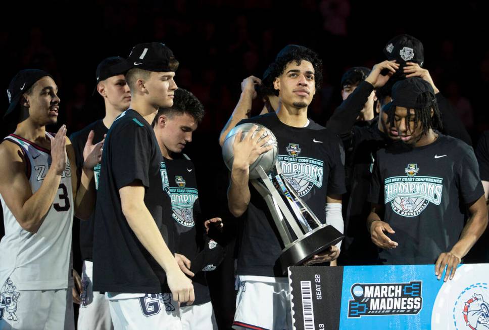 Las Vegas native and Gonzaga Bulldogs guard Julian Strawther, second from right, celebrates wit ...