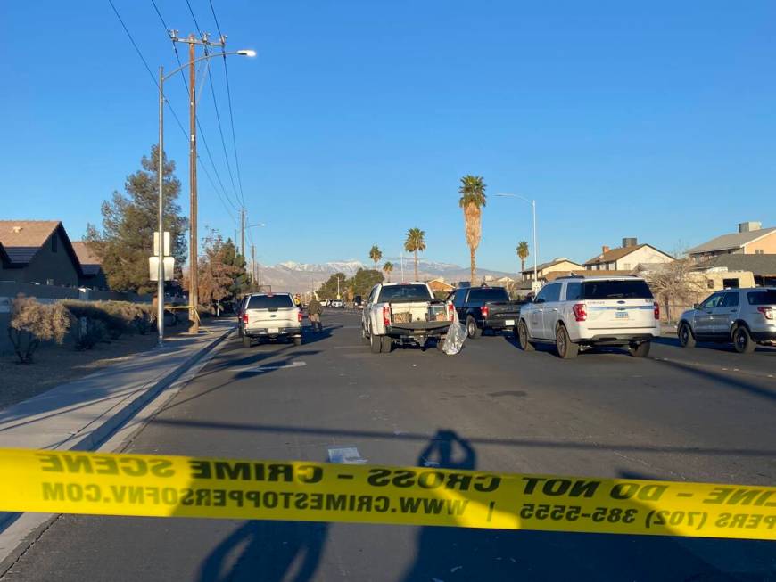 Las Vegas police investigate a fatal crash at the intersection of Gowan and Walnut roads in the ...