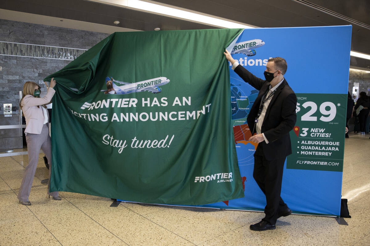 Frontier Airlines Vice President of Marketing Tyri Squyres, left, and Harry Reid International ...