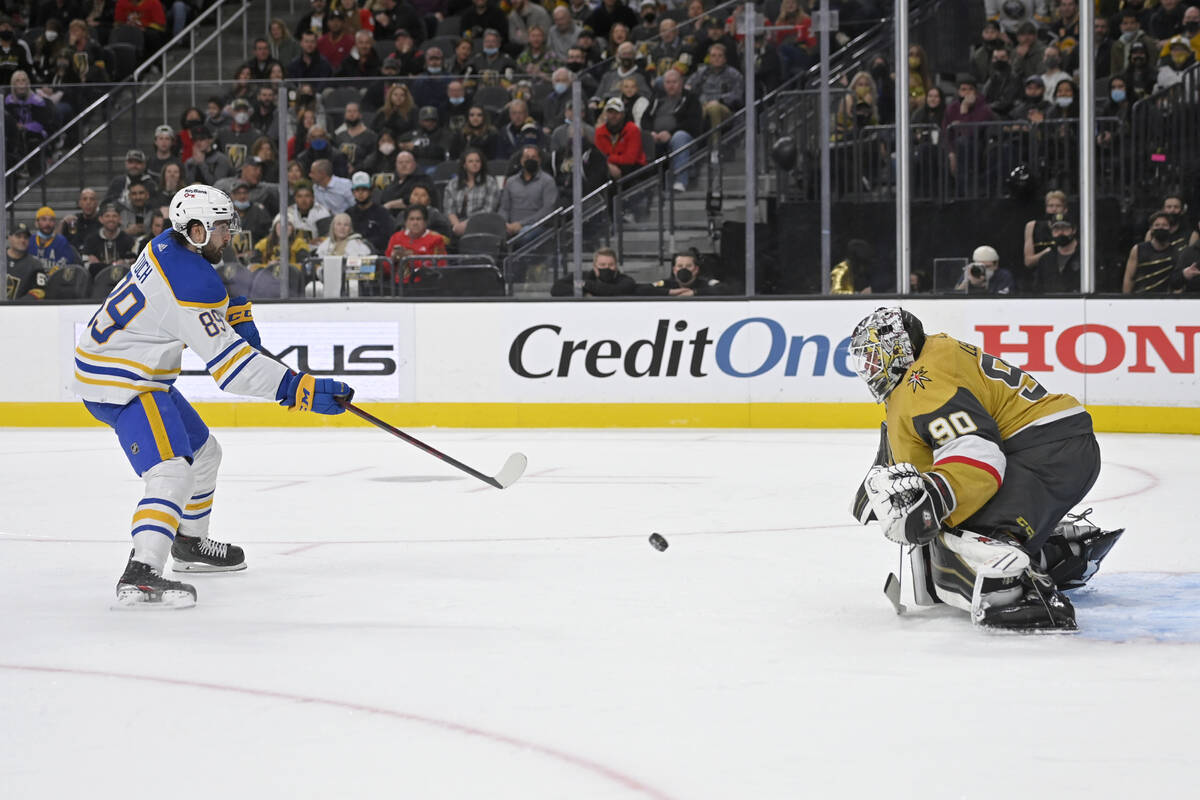 Buffalo Sabres right wing Alex Tuch (89) shoots on Vegas Golden Knights goaltender Robin Lehner ...