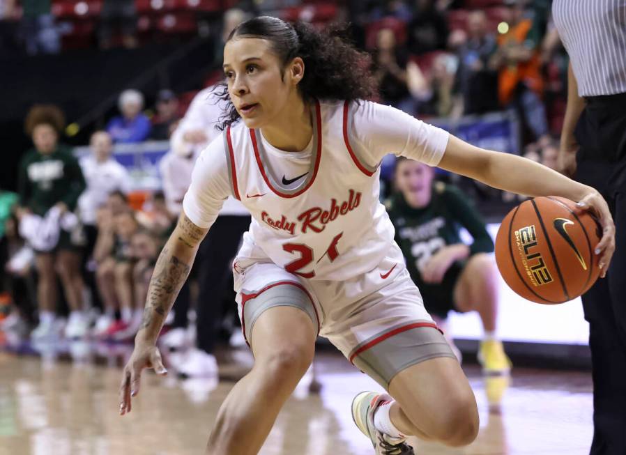 UNLV Lady Rebels guard Essence Booker (24) drives the ball against Colorado State Rams during t ...