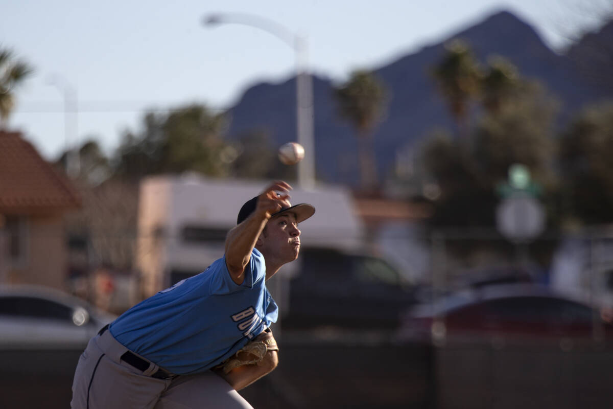 Centennial’s Ryan Martinez pitches to Basic during a high school baseball game at Basic ...