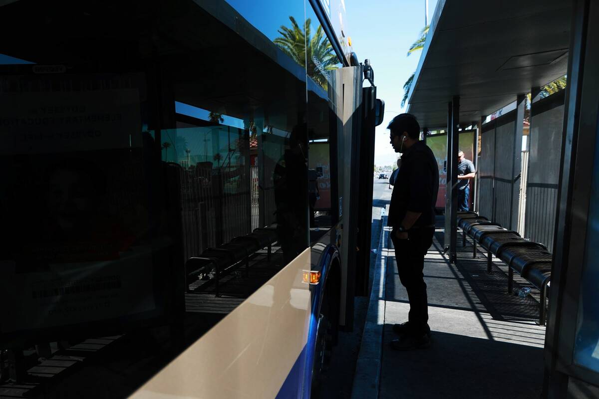 A bus waits for riders near the intersection of Flamingo Road and Maryland Parkway in Las Vegas ...