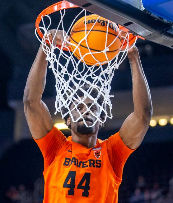 Oregon State Beavers forward Ahmad Rand (44) dunks the ball late versus the Oregon Ducks during ...