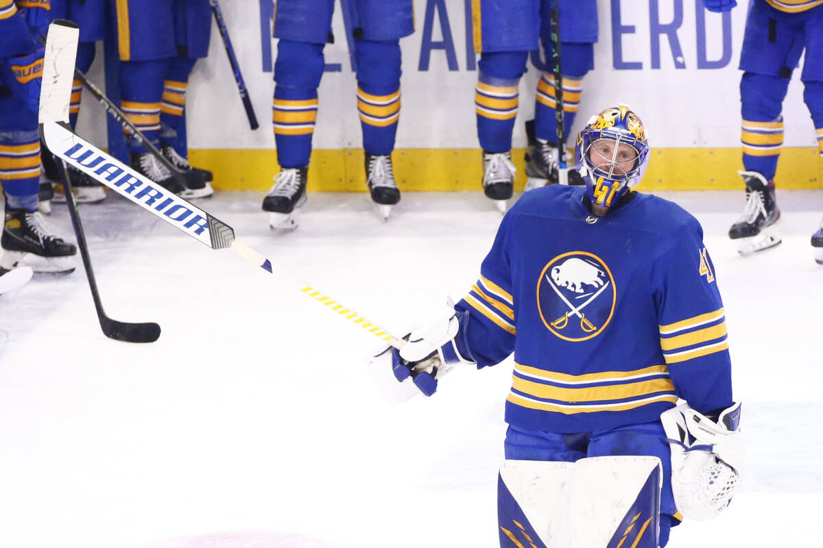 Buffalo Sabres goaltender Craig Anderson (41) celebrates his 300th career victory following the ...