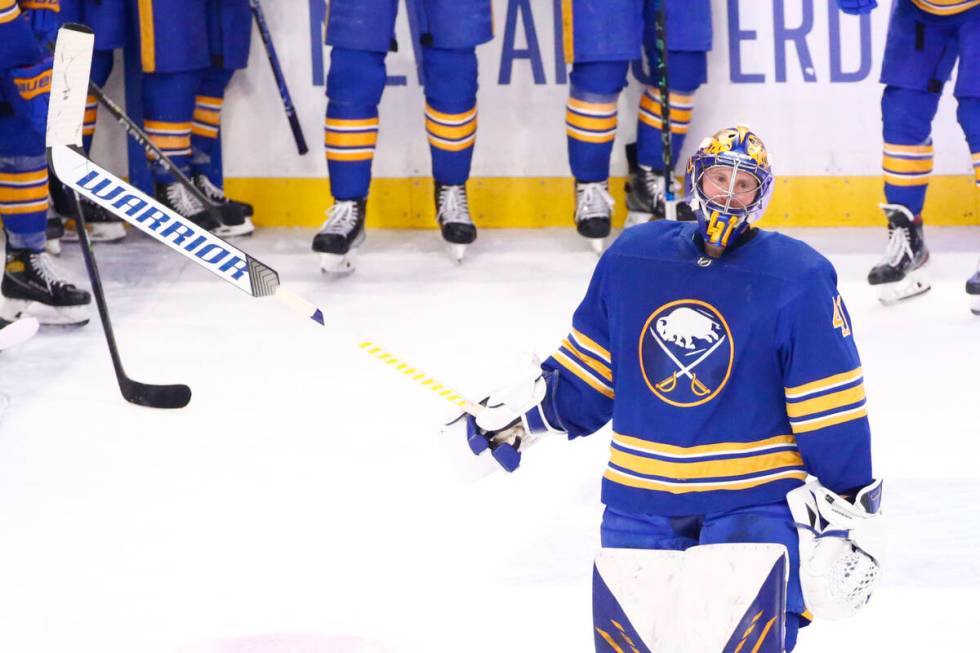 Buffalo Sabres goaltender Craig Anderson (41) celebrates his 300th career victory following the ...