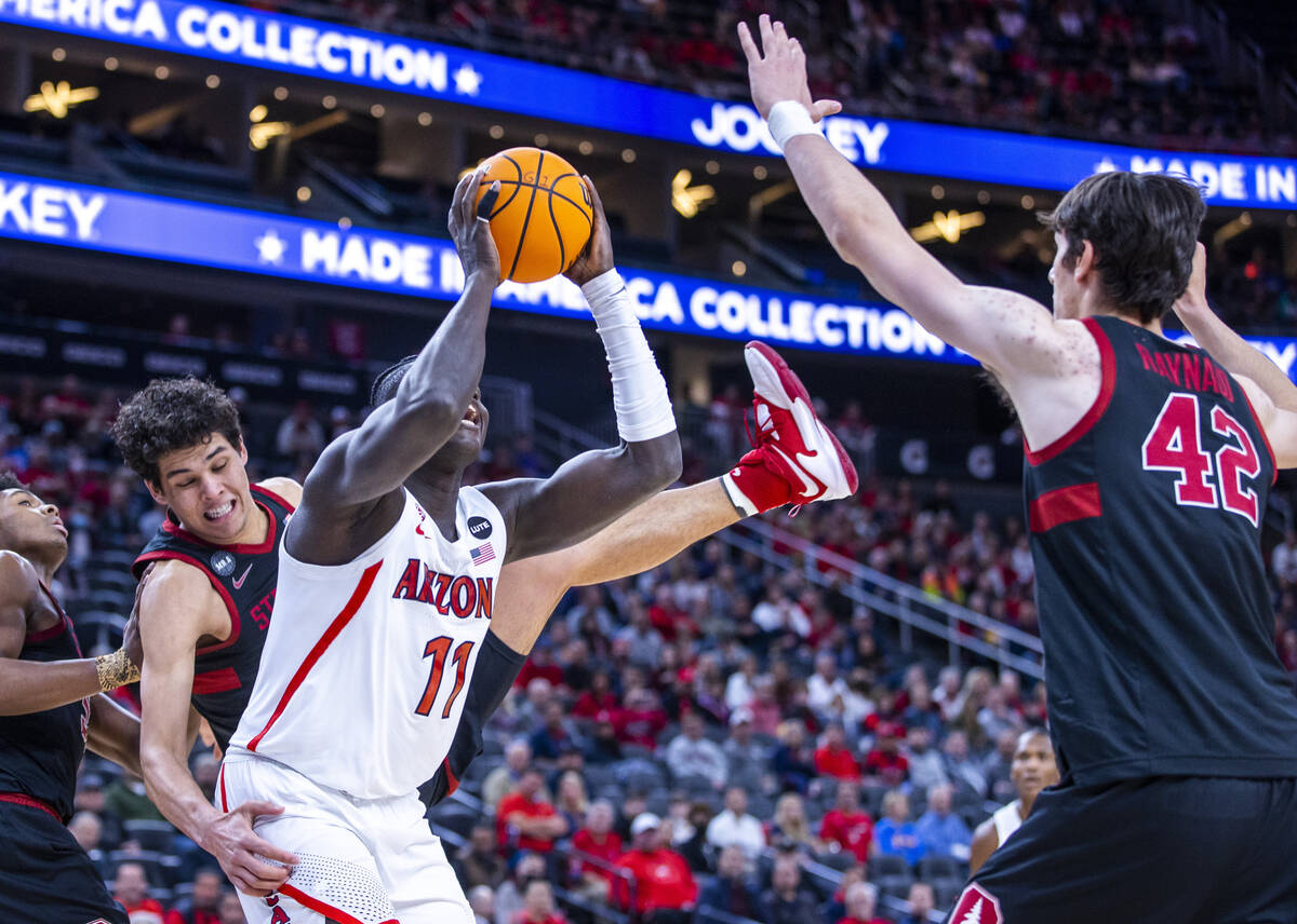 Arizona Wildcats center Oumar Ballo (11) looks to shoot as Stanford Cardinal forward Brandon An ...