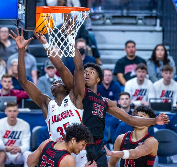 Arizona Wildcats center Christian Koloko (35) has the ball taken away by Stanford Cardinal forw ...