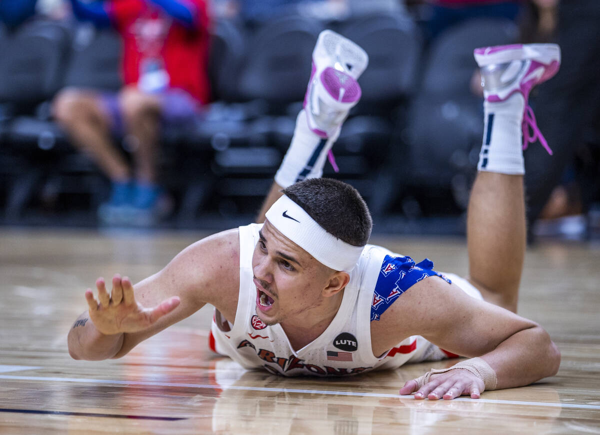 Arizona Wildcats guard Kerr Kriisa (25) yells in pain after a leg injury versus the Stanford Ca ...