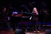 Anna Nichols, 10, sings as "Le Reve" conductor Michael Brennan plays the piano during the Compo ...