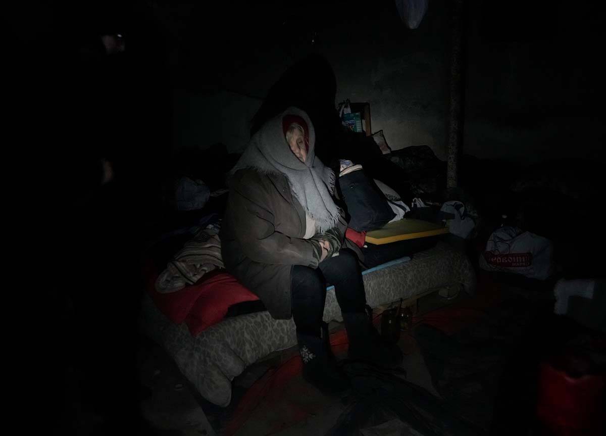 An elderly resident hides in a basement for shelter with no electricity, water or food in the c ...