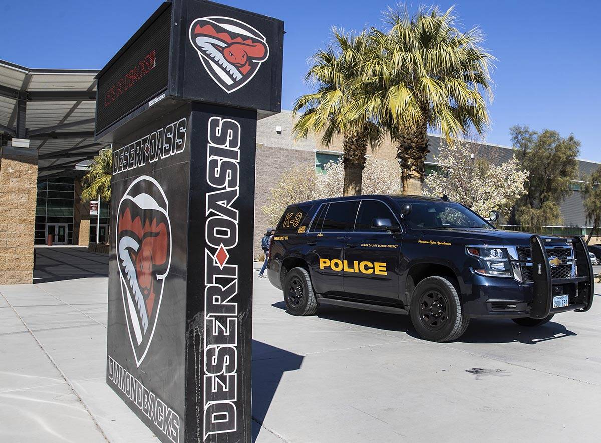 The Clark County School District police vehicle is seen outside of Desert Oasis High School on ...