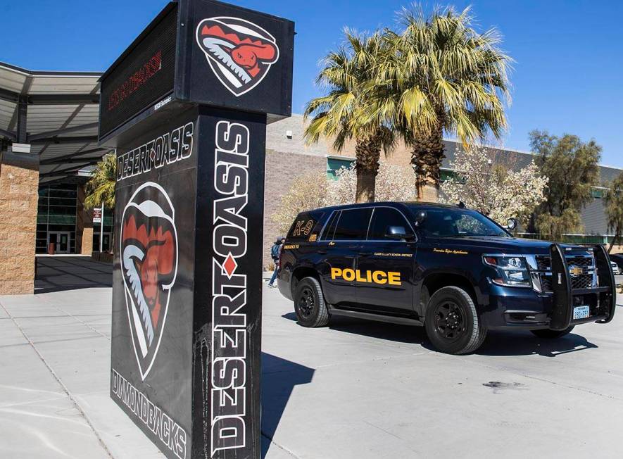 The Clark County School District police vehicle is seen outside of Desert Oasis High School on ...