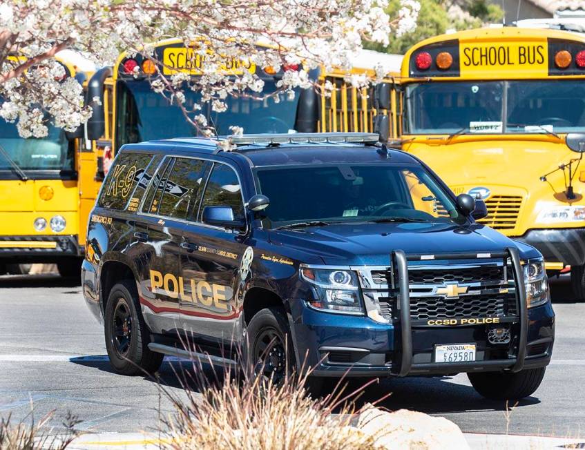 The Clark County School district police vehicle is seen outside of Desert Oasis High School on ...