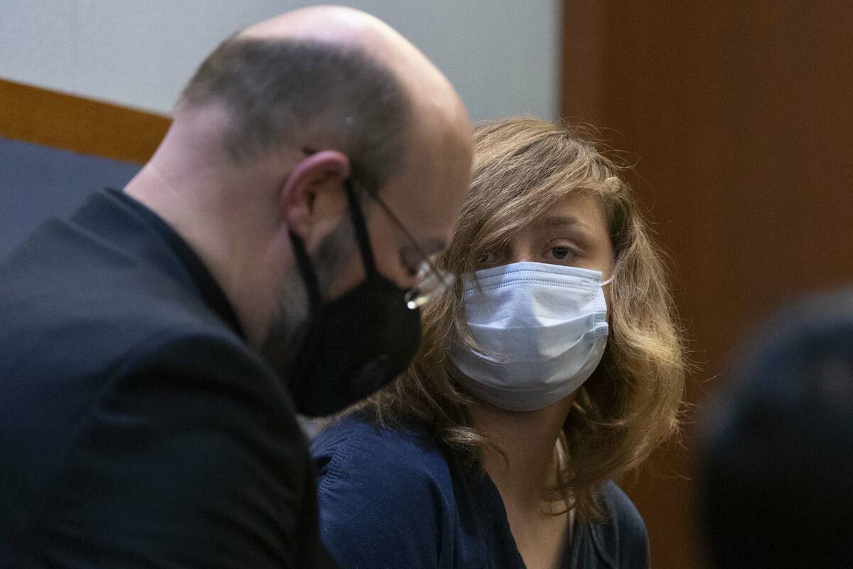 Aria Styron, 21, appears in court with her defense attorney T. Augustus Clause during her preli ...