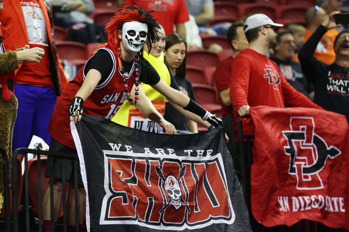 Fans cheers during the first half of the Mountain West Conference Men's Basketball Tournament f ...