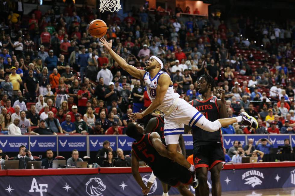 Boise State Broncos guard Marcus Shaver Jr. (10) attempts a shot over San Diego State Aztecs gu ...