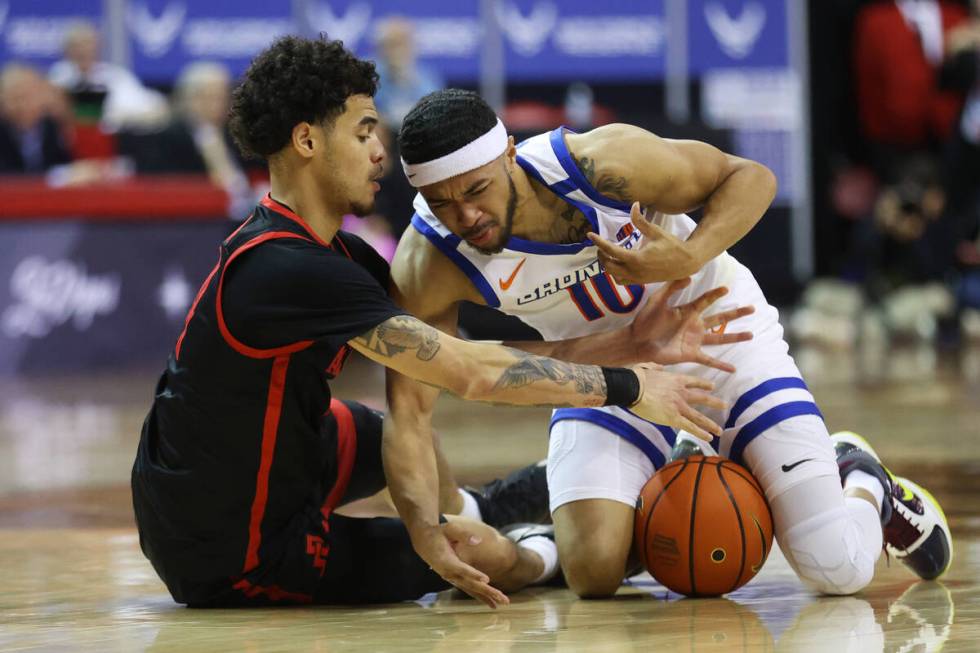 San Diego State Aztecs guard Trey Pulliam (4) and Boise State Broncos guard Marcus Shaver Jr. ( ...