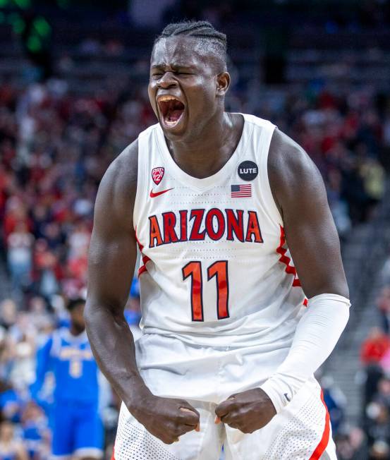 Arizona Wildcats center Oumar Ballo (11) celebrates their win over the UCLA Bruins 84-76 follow ...