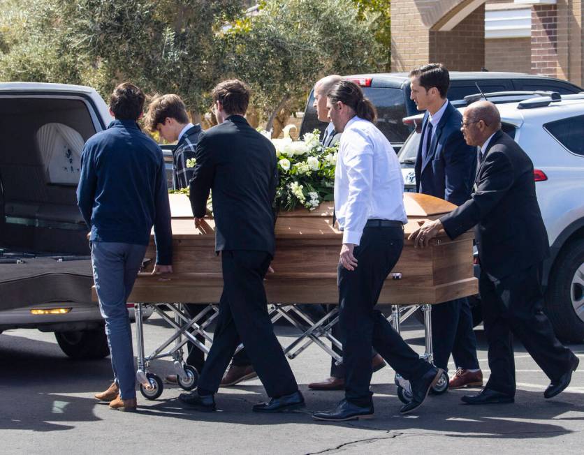 Pallbearers load the casket of Rex Patchett, 13, outside Church of Jesus Christ of Latter-day S ...