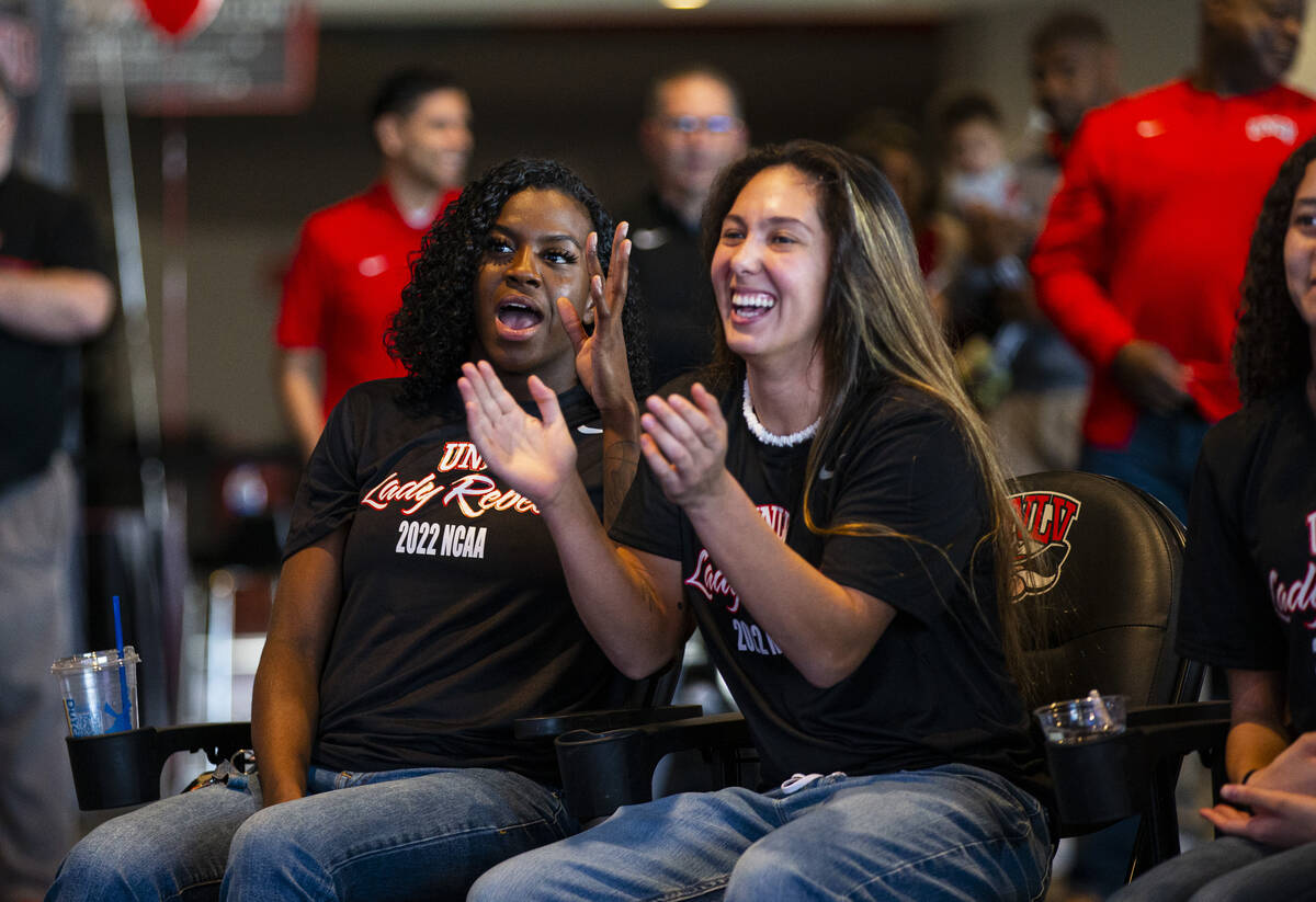 The UNLV Lady Rebels, including center Desi-Rae Young, left, and guard Alyssa Durazo-Frescas re ...