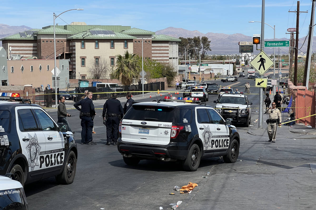 Las Vegas police investigate an officer-involved shooting near North Main Street and Foremaster ...